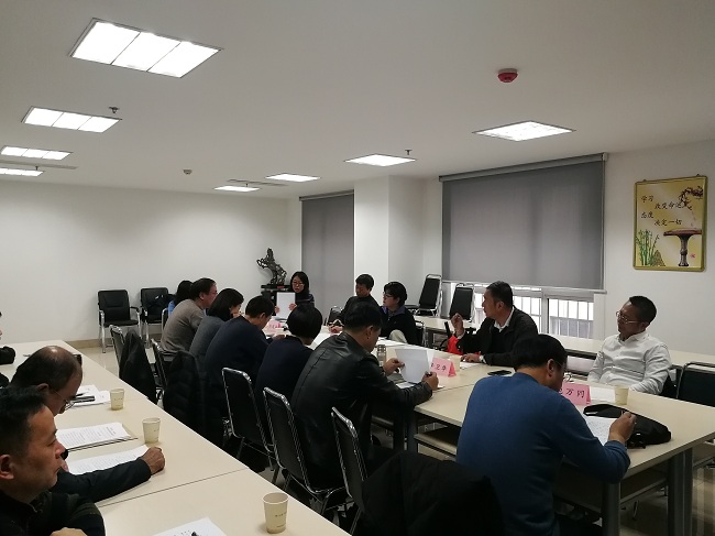 民建唐山市委召开委员履职报告会-1.jpg