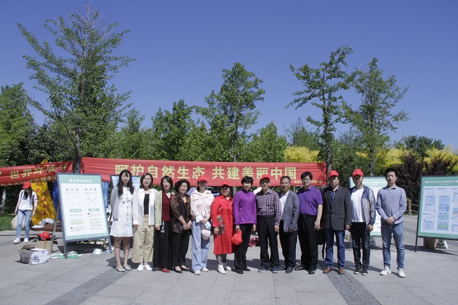 民建秦皇岛市北戴河总支联合开展国际环境日宣传活动 (3)-1.jpg