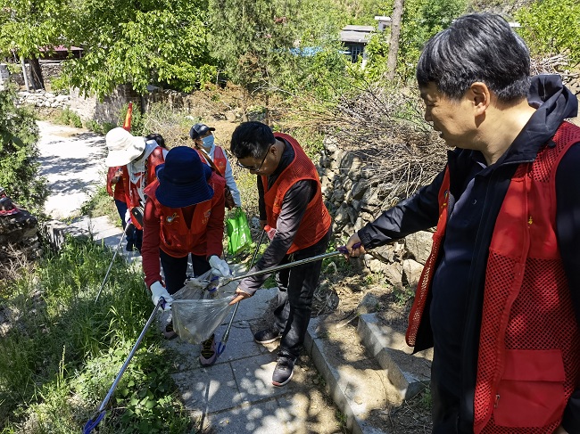 【“矢志不渝跟党走、携手奋进新时代”政治交接主题教育】民建秦皇岛市委抚宁区支部开展“跟党走、悟思想、护长城”主题会员日活动5-1.jpg