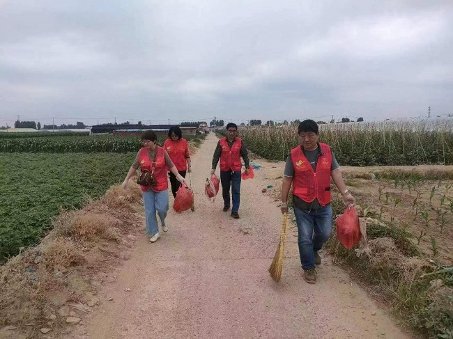 民建秦皇岛市委抚宁区支部开展人居环境社会服务活动1-1.jpg