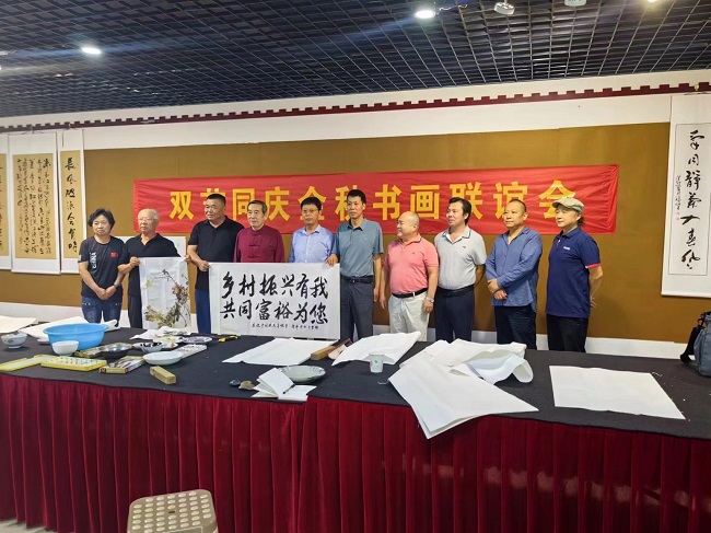 20231007民建保定市委文化宣传委员会参加望都县助力农民丰收节书画联谊活动2-1.jpg