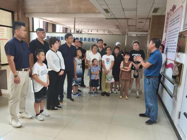民建秦皇岛市委商贸支部联合建设大街办事处开展慰问活动1 (1) (2).jpg