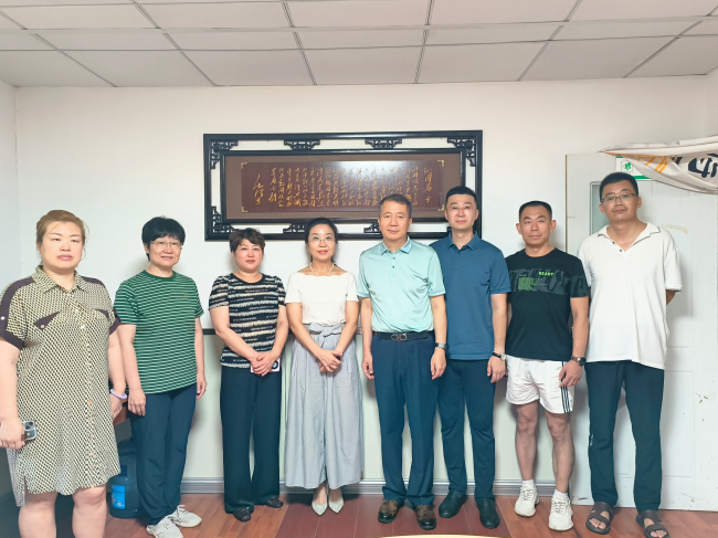 民建唐山市委路北区工委七支部走访会员之家——武连仲易道门诊部 (2).jpg