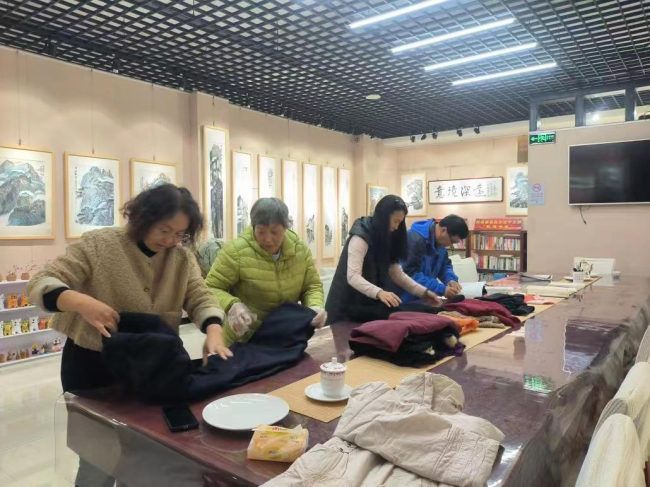 民建抚宁区支部衣旧情深 让爱循环 (2) (2).jpg