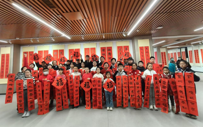 20250102民建保定市委文化宣传委员会、东风支部、建设支部在保定市图书馆组织“迎新春 送祥福”春联展2.jpg