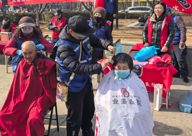 民建秦皇岛市委开展 学雷锋文明实践活动 传承雷锋精神 (2).jpg