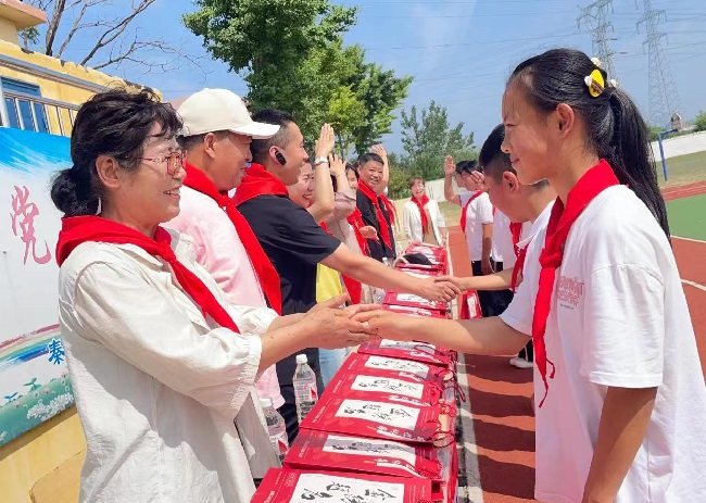 民建秦皇岛市委海港区委开展“音乐助学行动” (2)-1.jpg